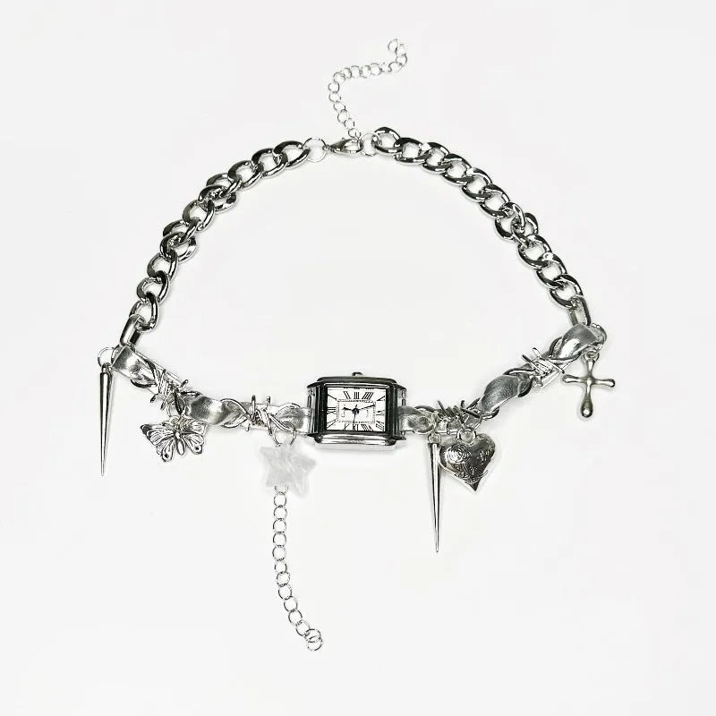 Dark multi-layer cross necklace with twin clavicle chains showing adjustable length and alloy construction