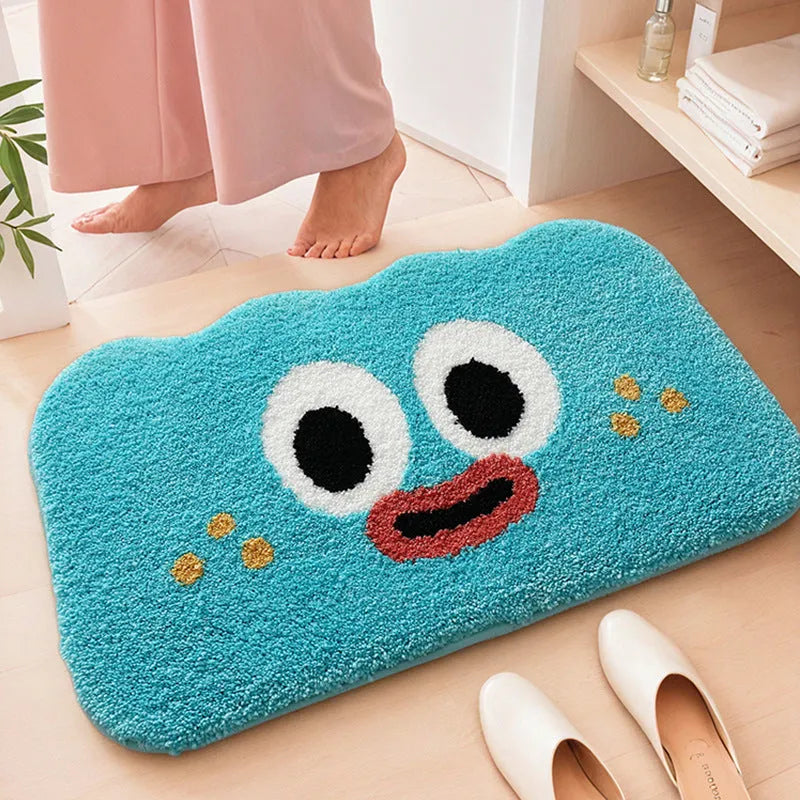 Cartoon anime print bathroom mat in soft polyester fibre, shown in one of five colours and three available sizes.