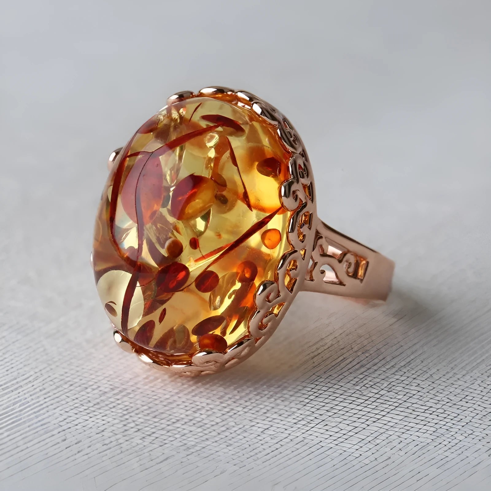 Amber beeswax ring with New Amber Type A colour and ethnic style design on alloy band