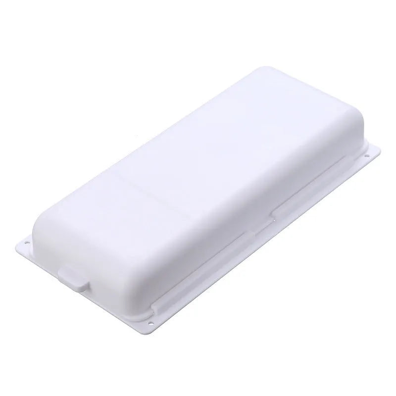 White plastic storage drawer with a cover and internal grid compartments, shown mounted underneath a wooden table.