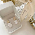 Square freshwater pearl stud earrings with geometric quadrilateral faces in purple, white or pink colours