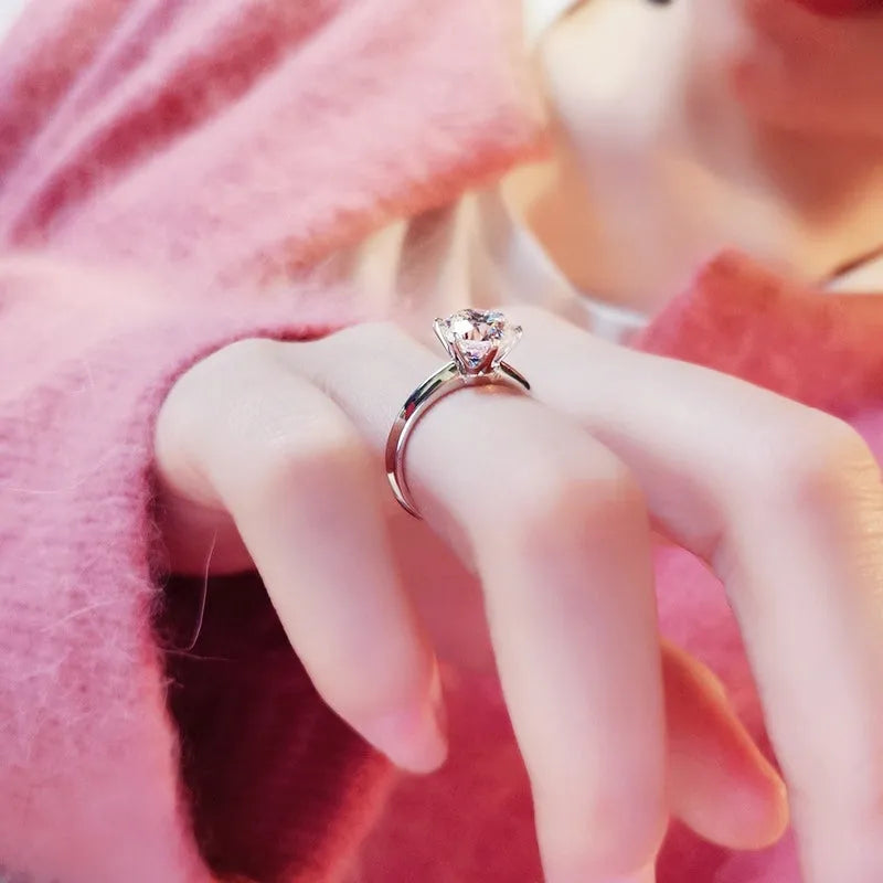 White gold plated geometric women's ring with six-claw zircon setting on finger