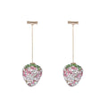 Geometric red strawberry stud earrings with spot drill texture on a zinc alloy post.