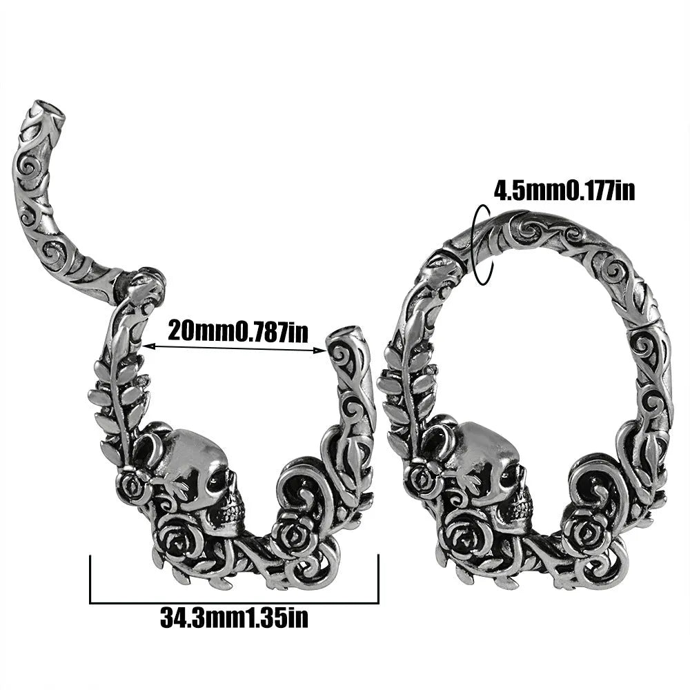 A pair of fashion earrings with a raised totem pattern, made from stainless steel in one of 15 available colour finishes.
