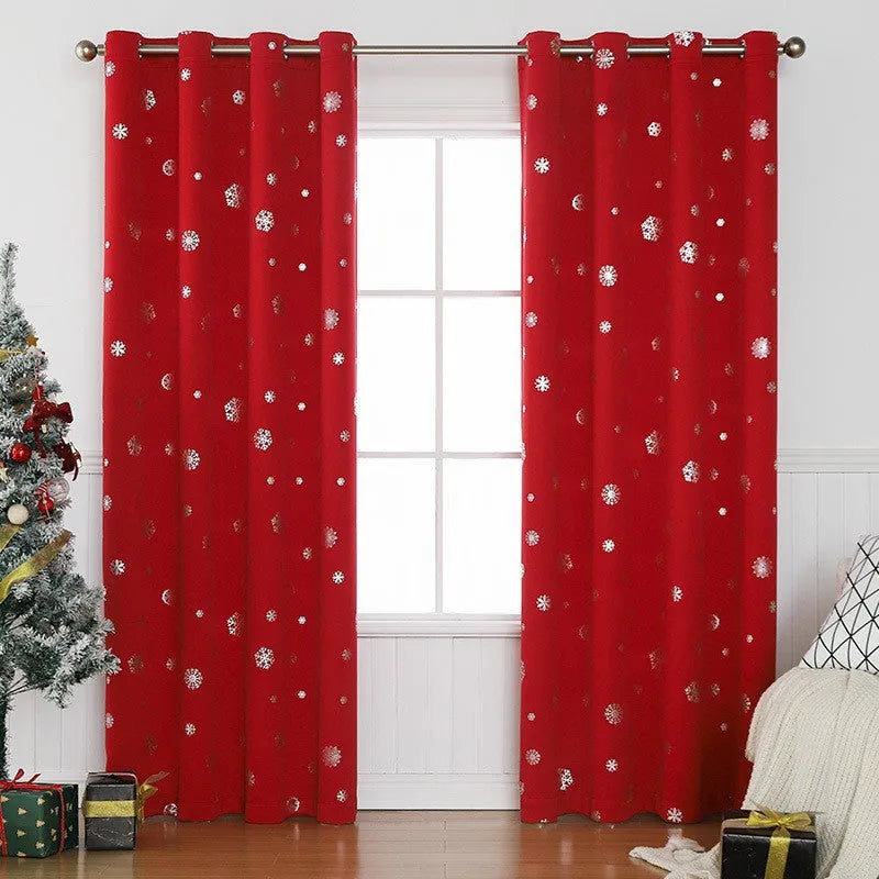 Red or green snowflake pattern shade cloth curtain with coordinating lace loops and iron hoops
