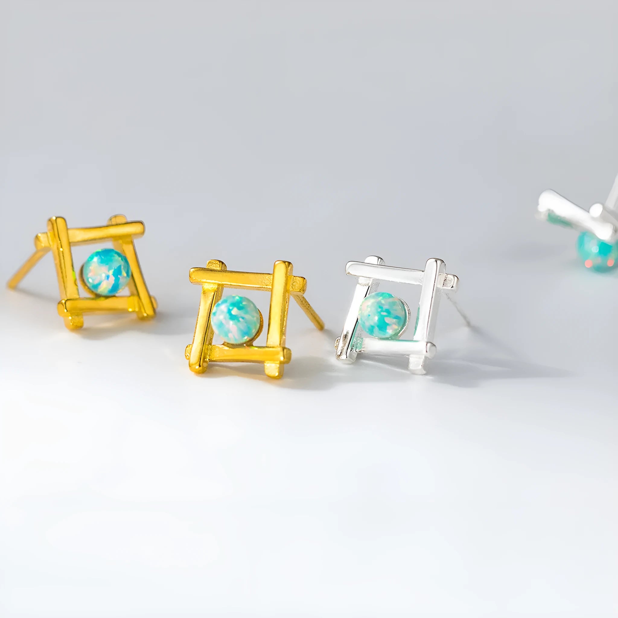 Geometric cross quadrangle stud earrings in S925 silver with Seiko treatment