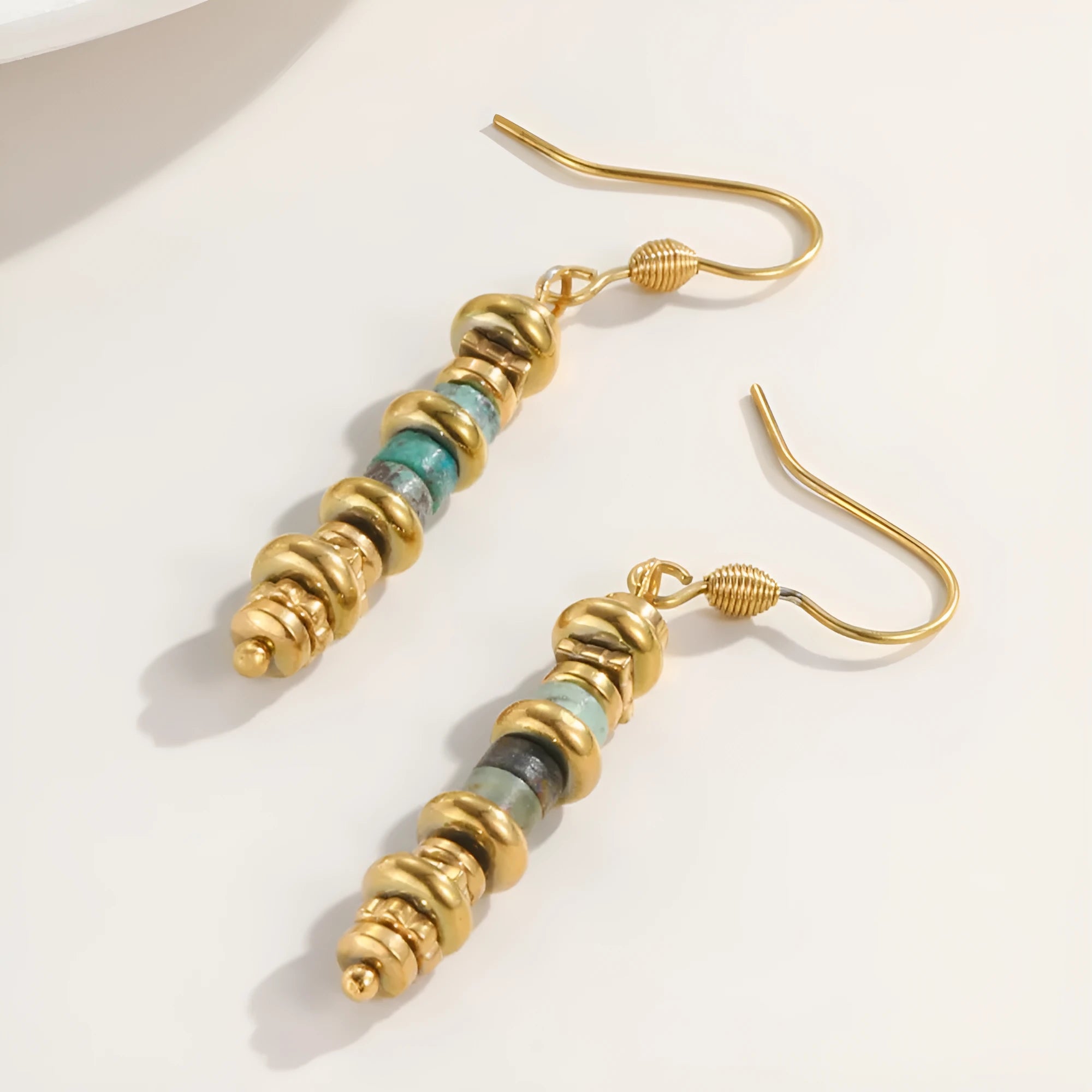 Geometric gold plated titanium steel dangle earrings with a retro design.