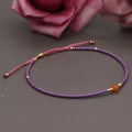 Handmade women's colourful beaded bracelet with geometric glass beads in bohemian style