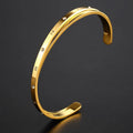 Open-ended stainless steel women's bracelet with zircon stones in rose, gold, or steel colour.