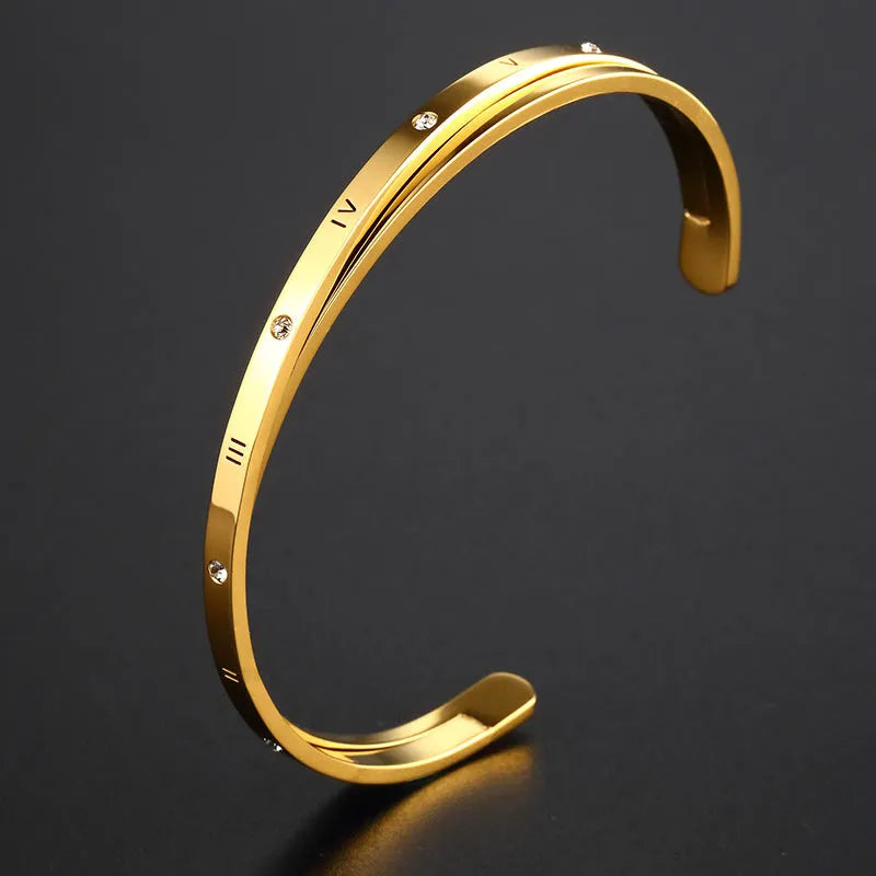 Open-ended stainless steel women's bracelet with zircon stones in rose, gold, or steel colour.