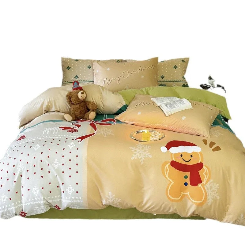 Christmas cartoon character bedding set with duvet cover, fitted sheet and pillowcases laid on a bed