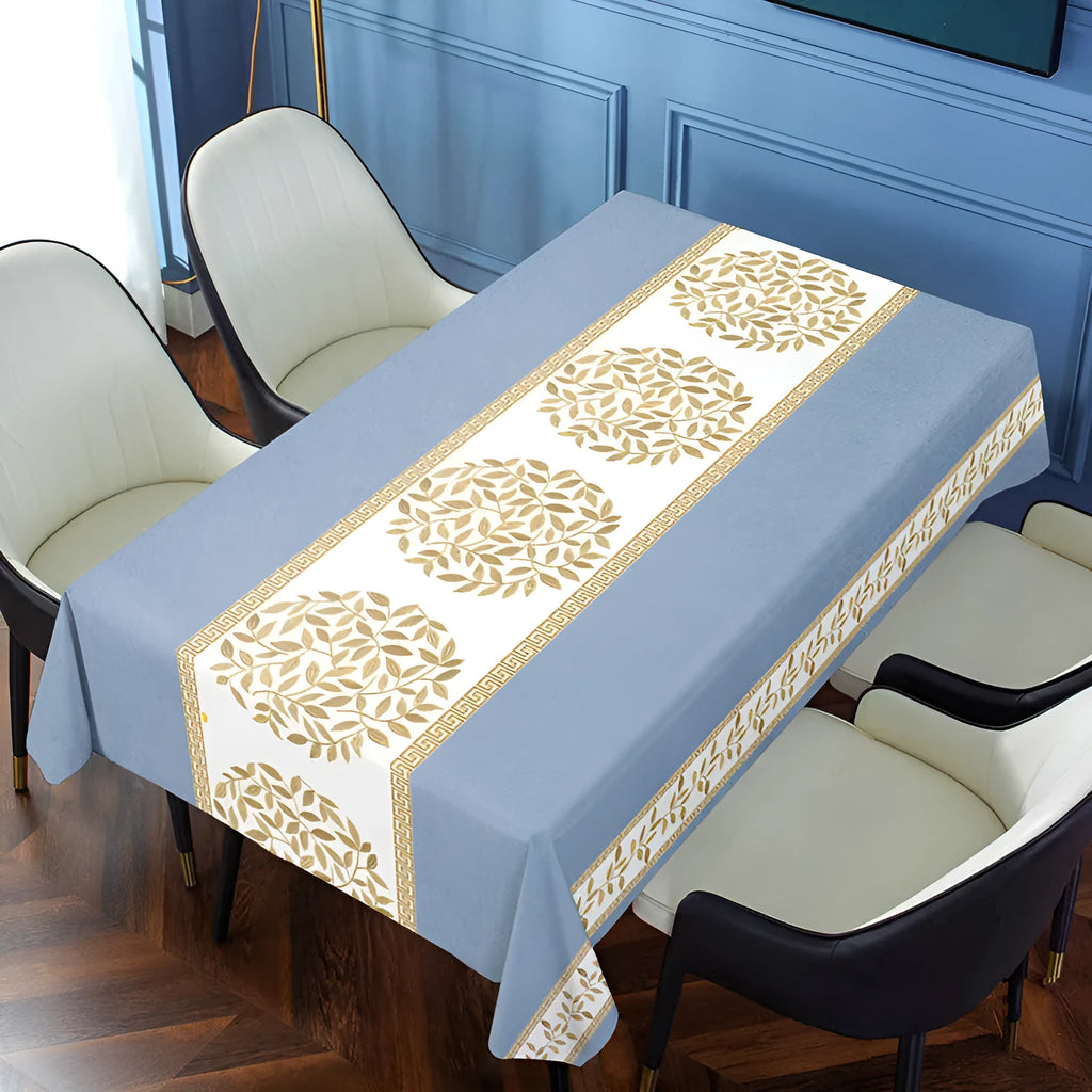 Rectangular PVC tablecloth on a coffee table, showing a geometric pattern and non-slip backing.
