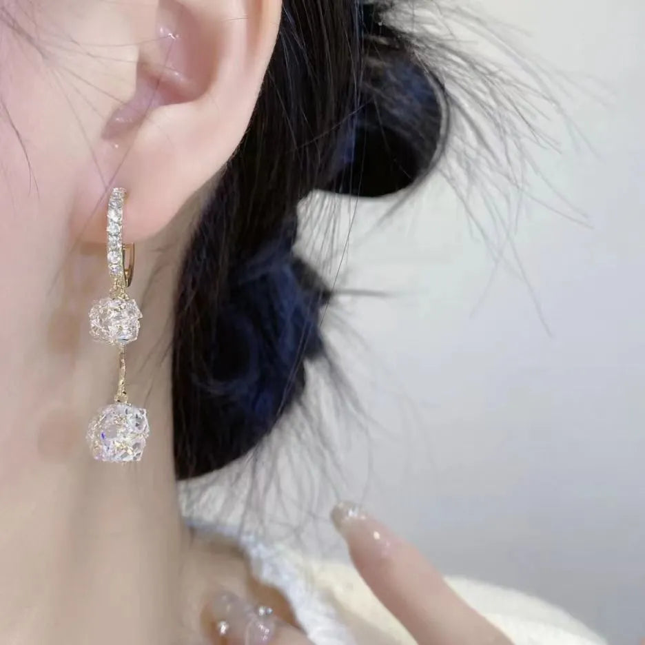 Silver confession balloon tassel earrings with rhinestone balls and drop shape design