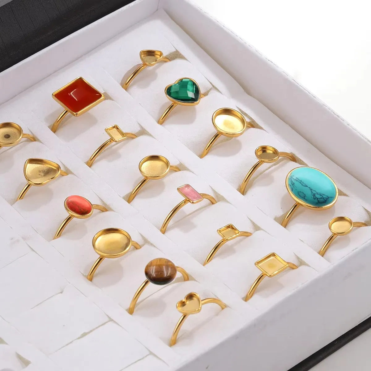 Golden-toned stainless steel ring holder with totem pattern and multiple shape options for jewellery organisation