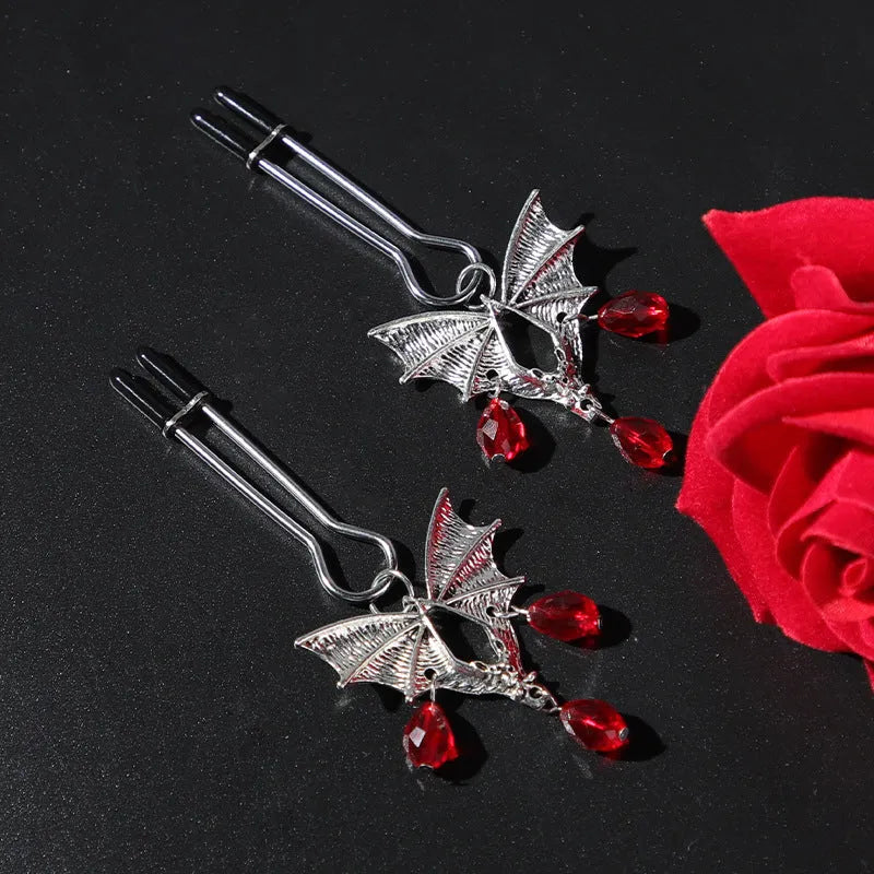 Silver alloy bat nipple clamp with ruby decoration and adjustable mechanism