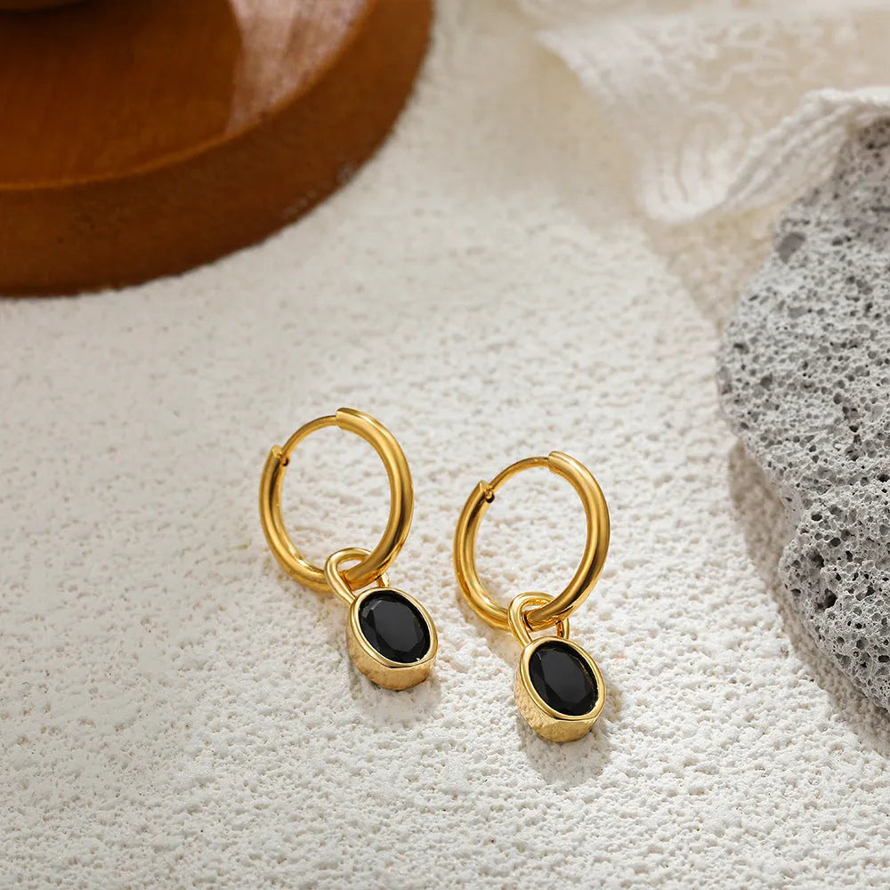 Women's retro-style oval earrings with zircon details on a copper base in six colour options.