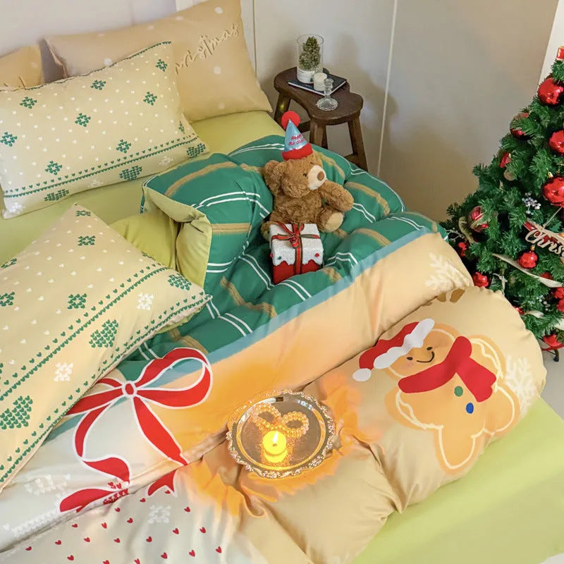 Christmas cartoon character bedding set with duvet cover, fitted sheet and pillowcases laid on a bed