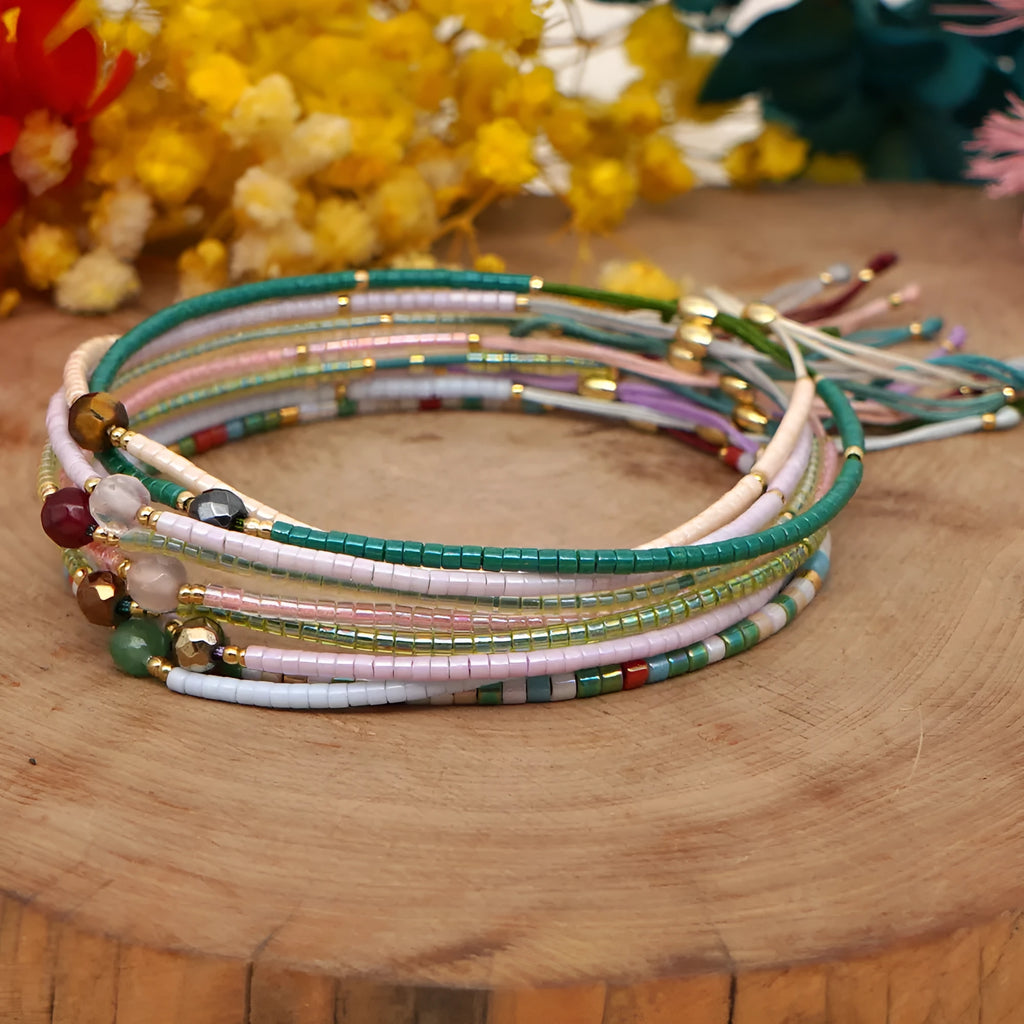 Handmade women's colourful beaded bracelet with geometric glass beads in bohemian style