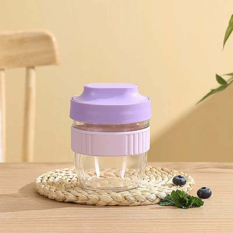 Green plastic salad cup with clear lid and integrated spoon showing 480ml capacity measurement