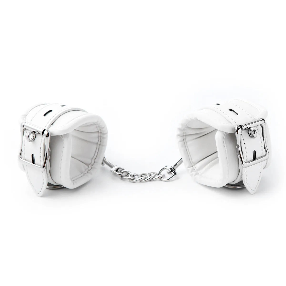White PU sponge bondage set showing handcuffs, foot cuffs, and a neck cuff arranged together.