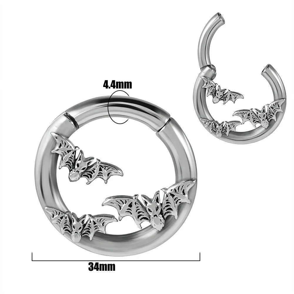 A pair of fashion earrings with a raised totem pattern, made from stainless steel in one of 15 available colour finishes.