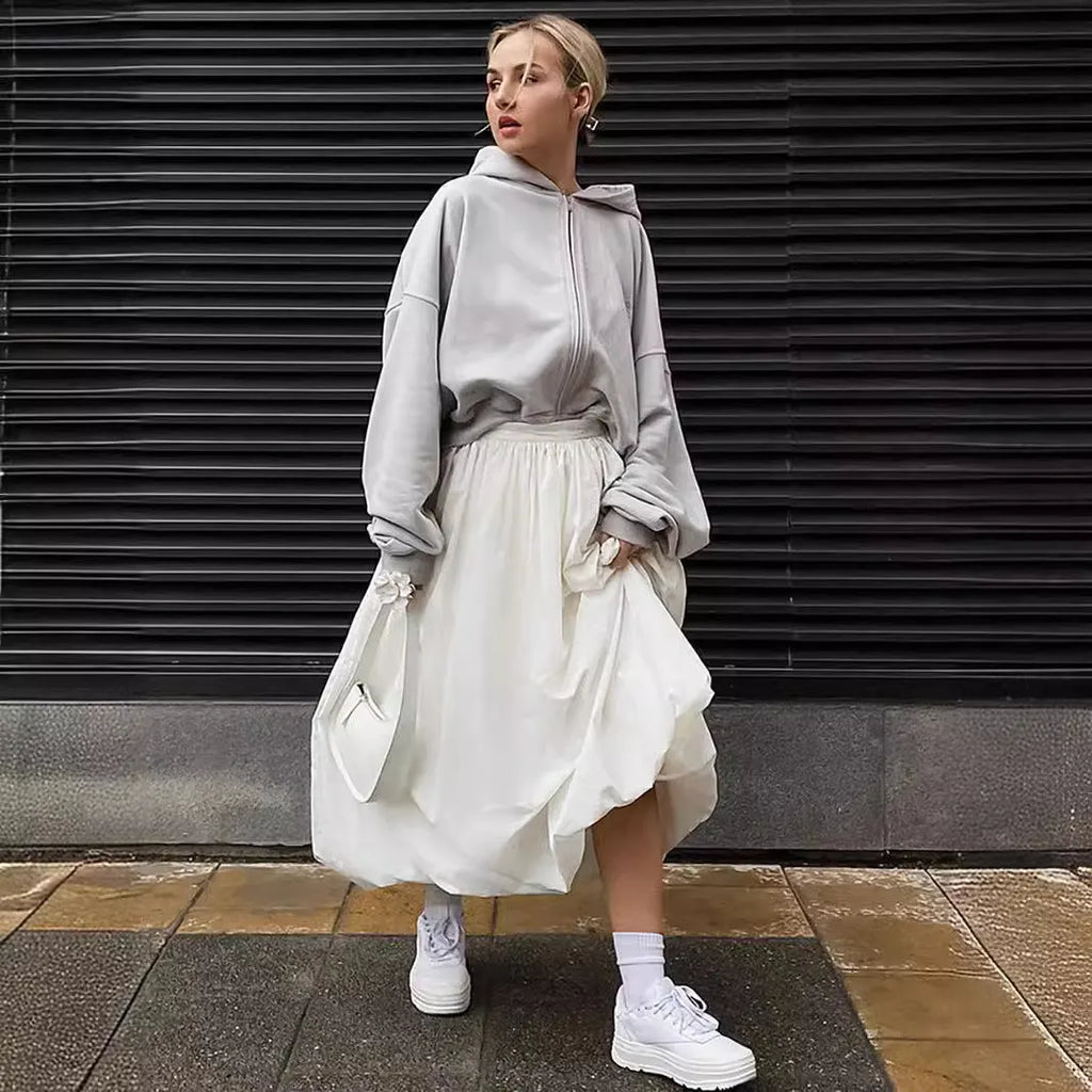 Women's solid colour cotton long skirt with elastic waistband in white or black options