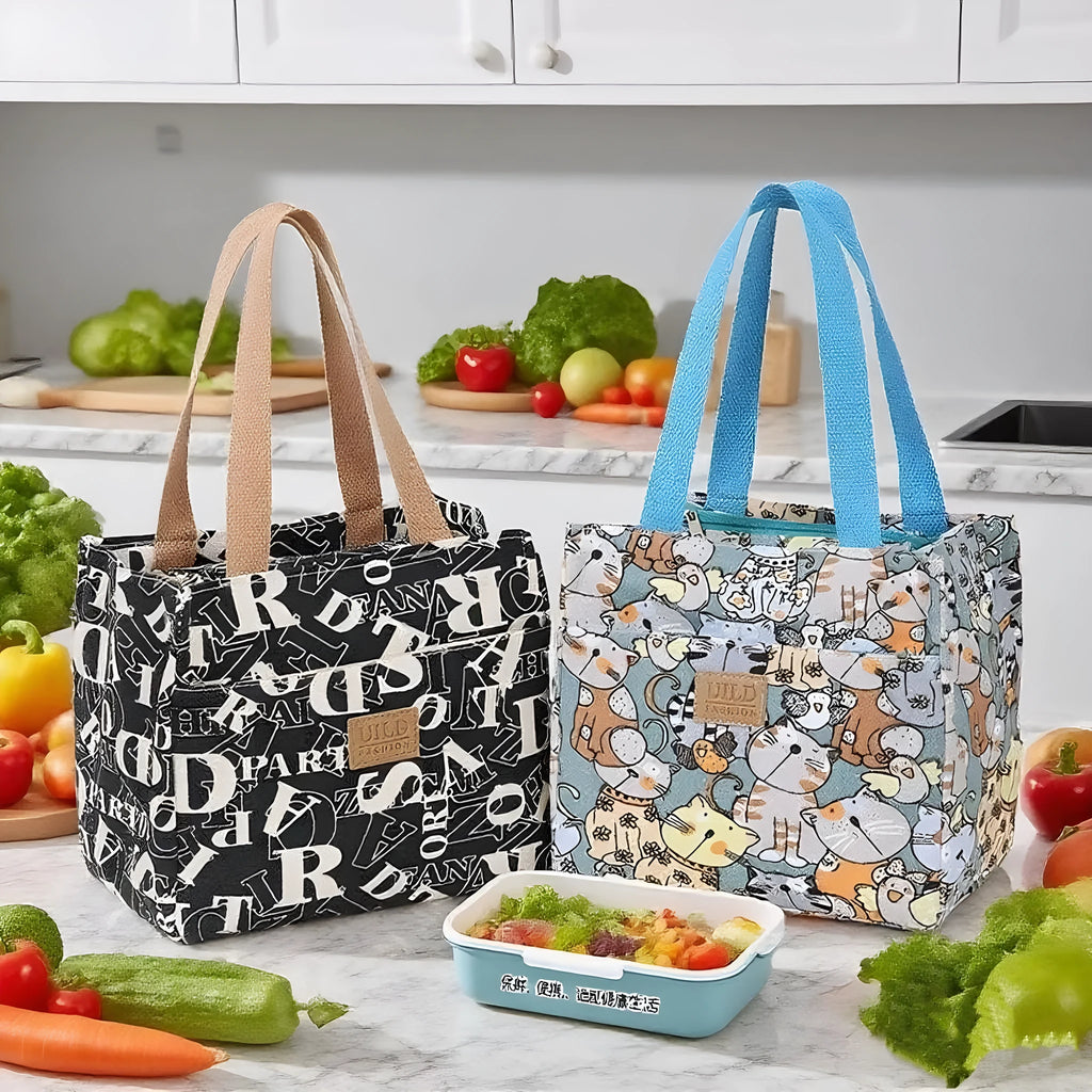 Women's printed floral canvas tote bag with aluminium frame open, showing large interior.