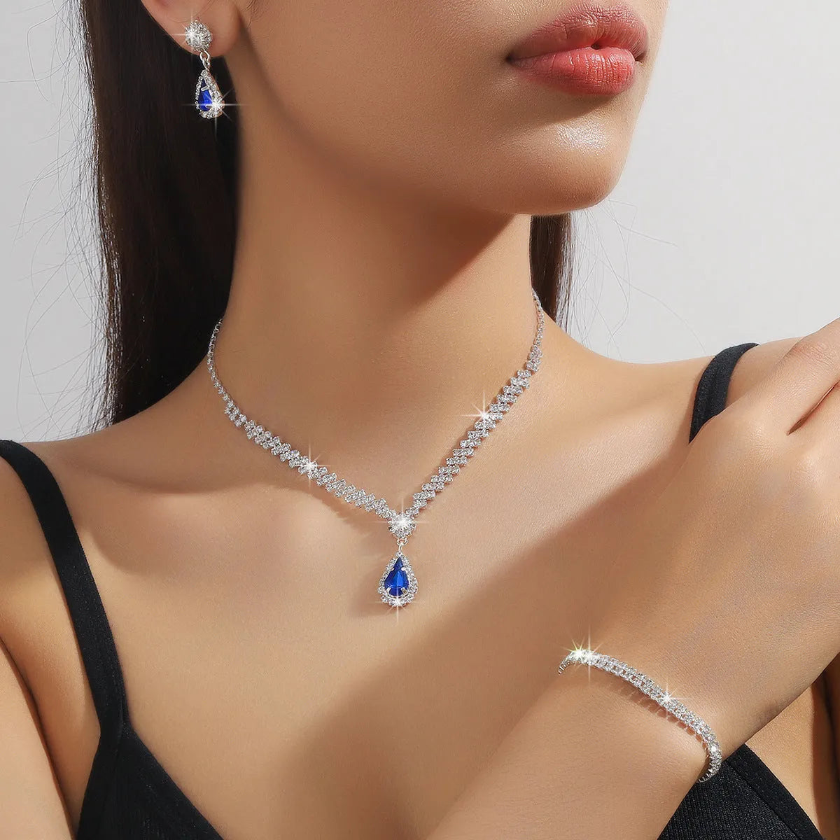 Claw chain necklace and earrings set with drop rhinestones in multiple colour options