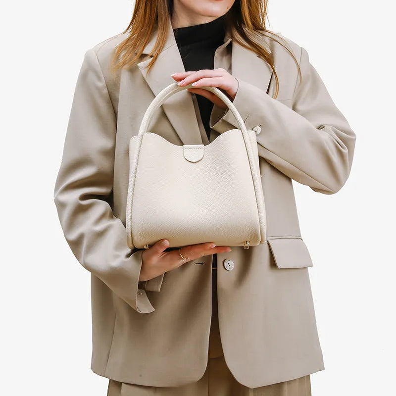 Genuine leather cylindrical vegetable basket handbag in selected colour with sewing thread detailing