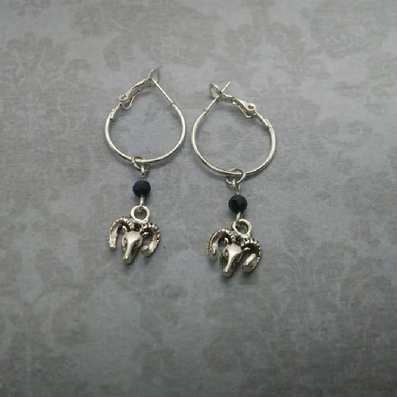 Silver-coloured alloy round ring earrings for women with a Tibetan antelope design.