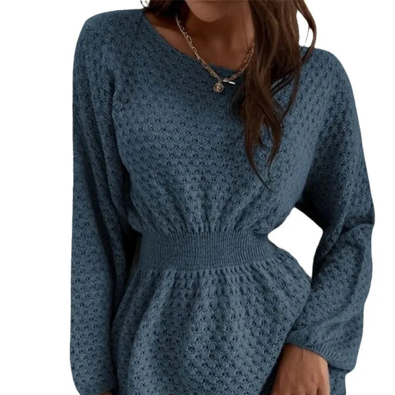 Blue women's knitted dress with hand-crocheted floral details and a fitted waist.