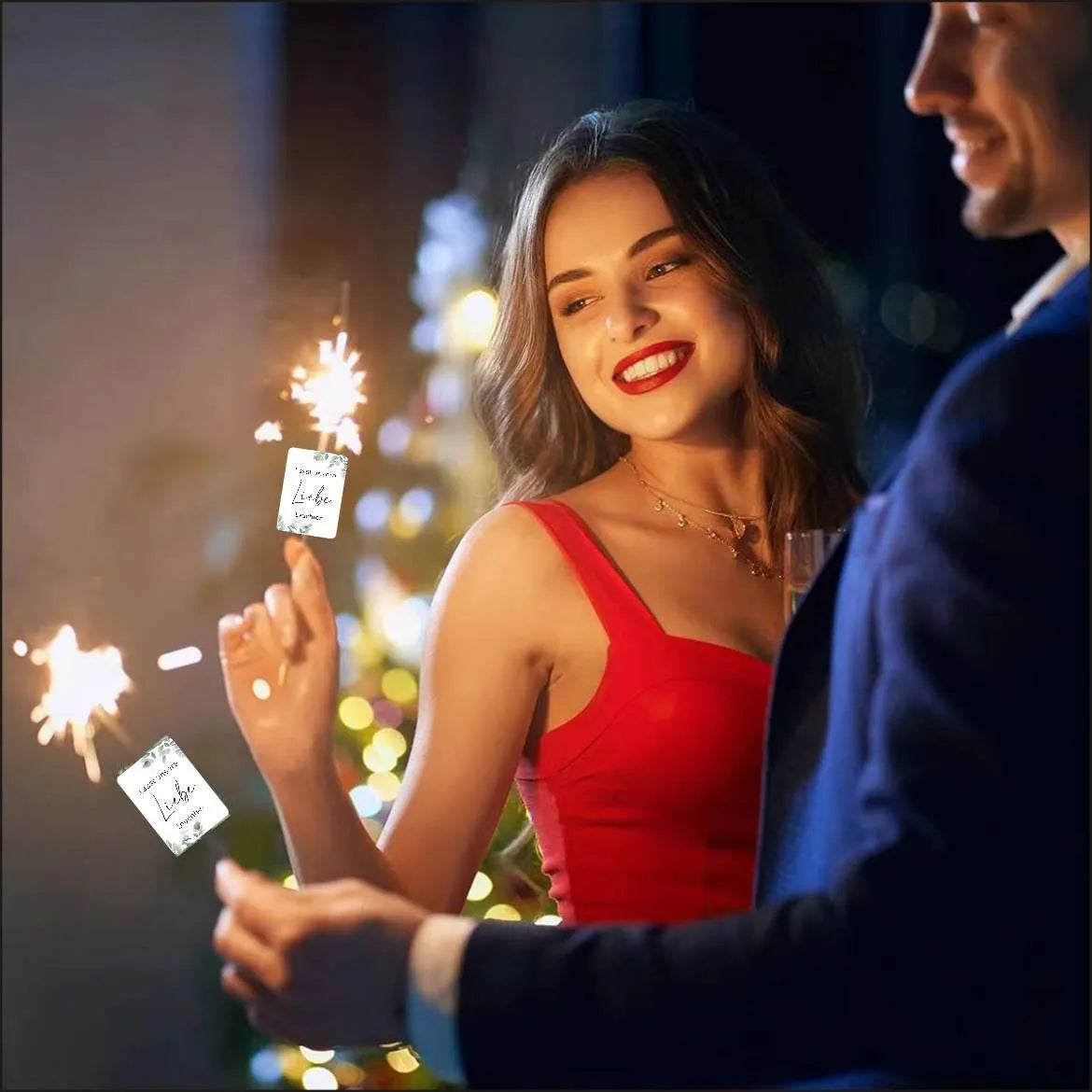 A pack of 50 white G45 style fireworks decorative labels for celebrations.