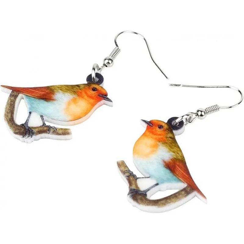 Blue Titmouse and snake motif acrylic drop earrings with geometric pendant shape on a white background.