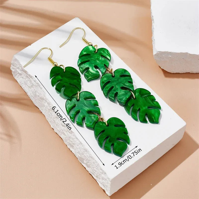 Acrylic drop earrings with coconut and jackfruit design on the ear hook in one of five styles.