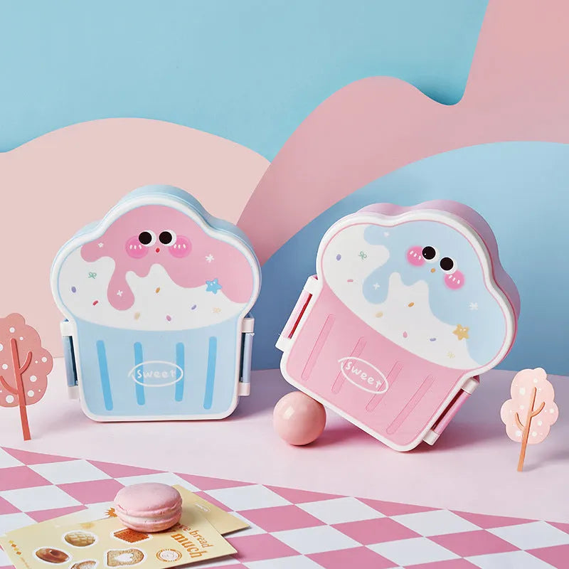 Pink and blue creative ice cream shaped plastic lunch box with compartments, includes spoon and fork.