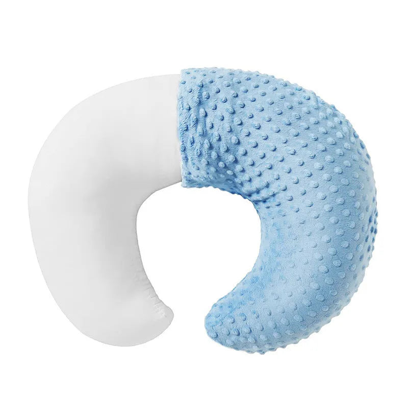 Nursing pillow with removable cover in light blue, featuring a built-in milk spilt preventer.