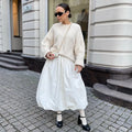 Women's solid colour cotton long skirt with elastic waistband in white or black options