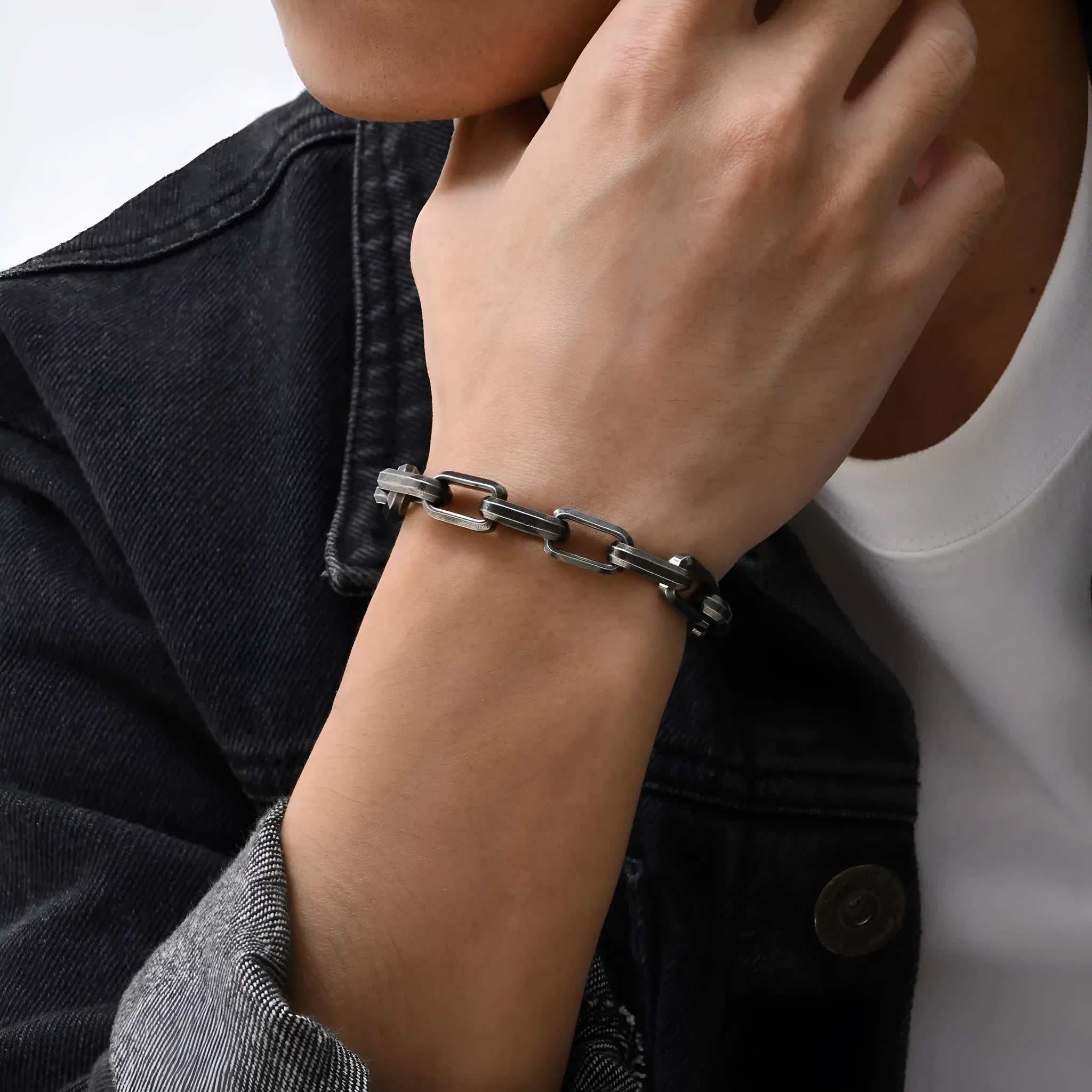 A minimalist square chain men's bracelet in titanium steel, shown in steel colour.