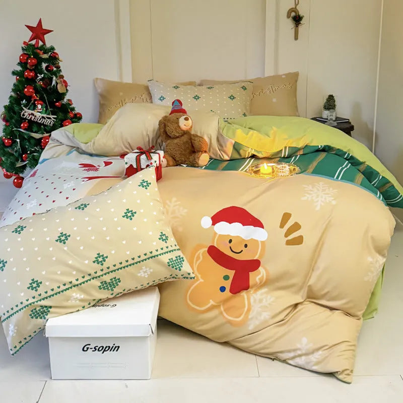 Christmas cartoon character bedding set with duvet cover, fitted sheet and pillowcases laid on a bed