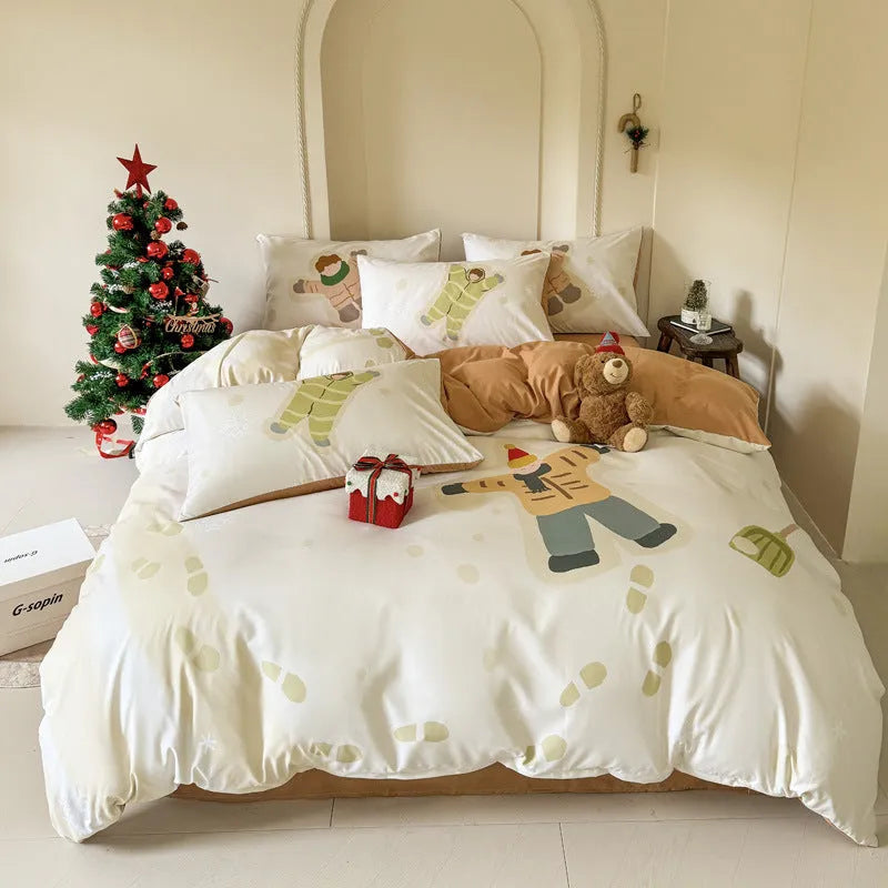 Christmas cartoon character bedding set with duvet cover, fitted sheet and pillowcases laid on a bed