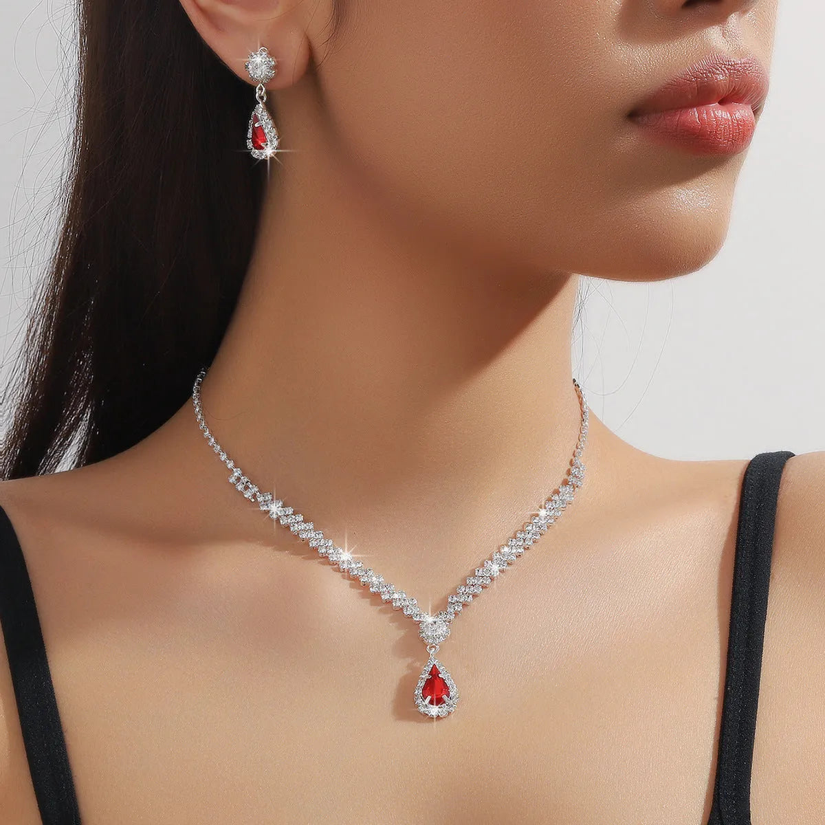 Claw chain necklace and earrings set with drop rhinestones in multiple colour options
