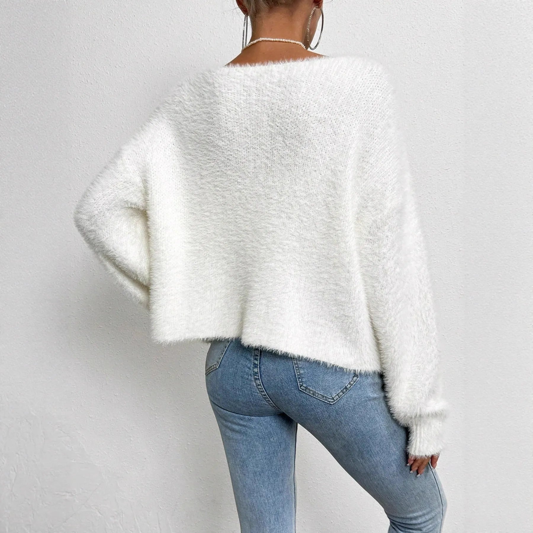 Women's white V-neck cardigan sweater made from polyester bead knitwear fabric