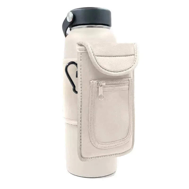 Fitness magnetic water bottle sleeve in black with a carabiner clip, shown on a sports bag.