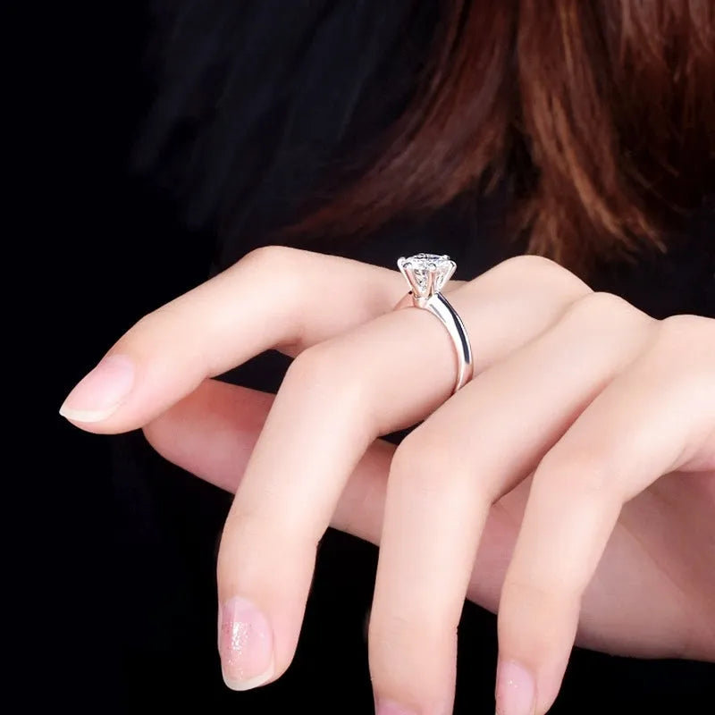 White gold plated geometric women's ring with six-claw zircon setting on finger