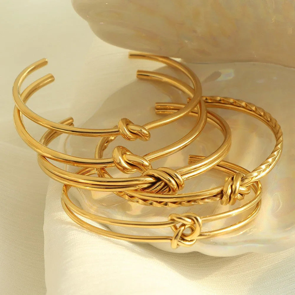 Women's adjustable stainless steel bracelet with knotted C-shaped open design and double-layer construction