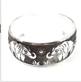 Ethnic carved open Miao silver bracelet with Roman shape and detailed openwork pattern