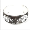 Ethnic carved open Miao silver bracelet with Roman shape and detailed openwork pattern