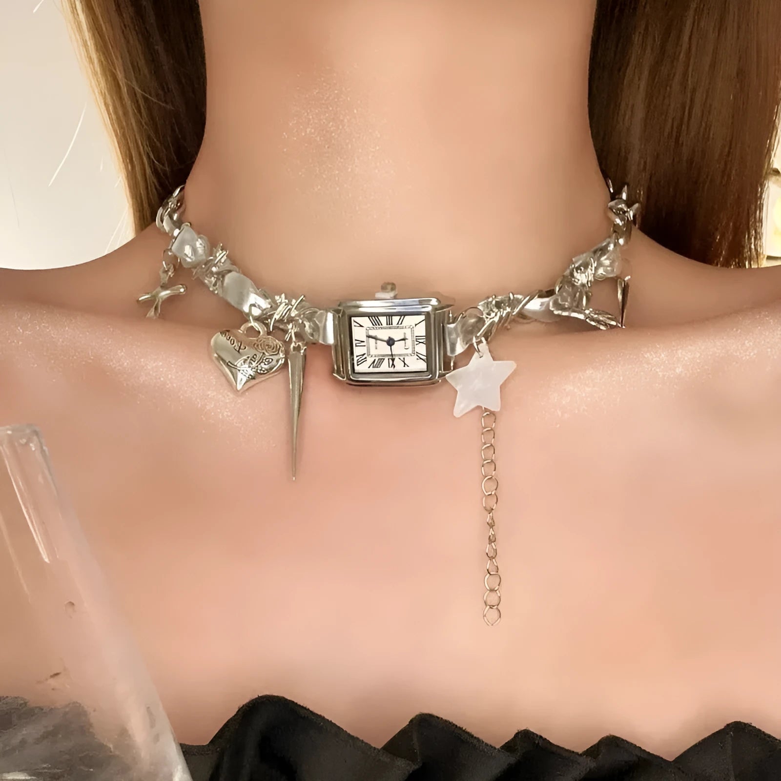 Dark multi-layer cross necklace with twin clavicle chains showing adjustable length and alloy construction