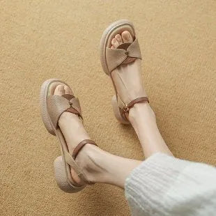 Women's beige chunky heel platform sandals with open toe and renewable leather upper.