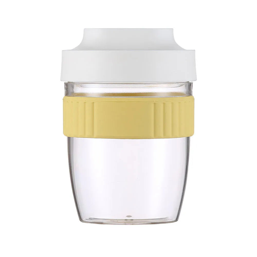 Green plastic salad cup with clear lid and integrated spoon showing 480ml capacity measurement
